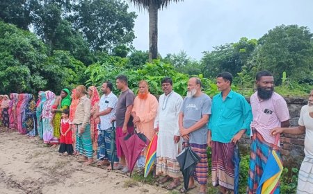 নগরকান্দায় গ্রামীণ সড়ক নির্মাণে বাঁধা, এলাকাবাসীর মানববন্ধন