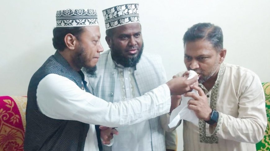 বিজয়ী হয়ে বিএনপি প্রার্থীকে মিষ্টি খাওয়ালেন জামায়াতের আমির হামজা